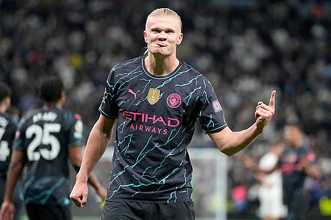 Erling Haaland celebrates scoring his second goal